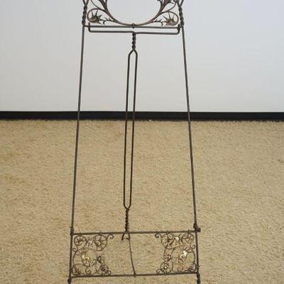 1121	ORNATE VICTORIAN STYLE BRASS & IRON EASLE, APPROXIMATELY 64 IN HIGH
