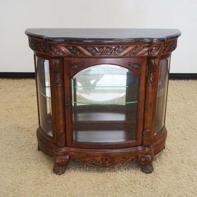 1124	ORNATE MARBLE TOP DISPLAY CABINET W/MIRROR BACK & BEVELED GLASS DOOR & SIDES, APPROXIMATELY 48 IN X 15 IN X 43 IN HIGH
