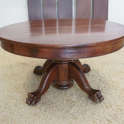 1120	55 IN ROUND CLAW FOOT MAHOGANY TABLE W/5 LEAVES, APPROXIMATELY 30 IN HIGH, LEAVES APPROXIMATELY 13 IN
