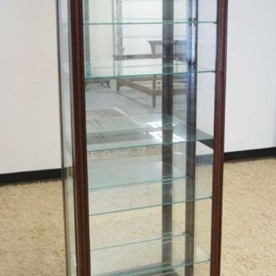 1030	NARROW HOWARD MILLER CURIO CRYSTAL CABINET W/INTERIOR LIGHTING & ADJUSTABLE GLASS SHELVES & MIRROR BACK, APPROXIMATELY 27 IN X 13 IN...
