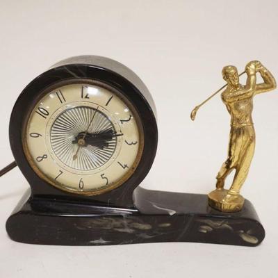 1241	ELECTRIC CLOCK W/FIGURE OF GOLFER, APPROXIMATELY 8 IN X 2 1/2 IN X 5 1/2 IN HIGH
