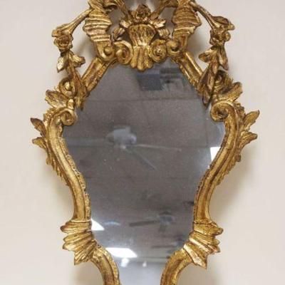 1084	ITALIAN GILT DECORATED HANGING MIRROR, APPROXIMATELY 16 IN X 27 IN HIGH
