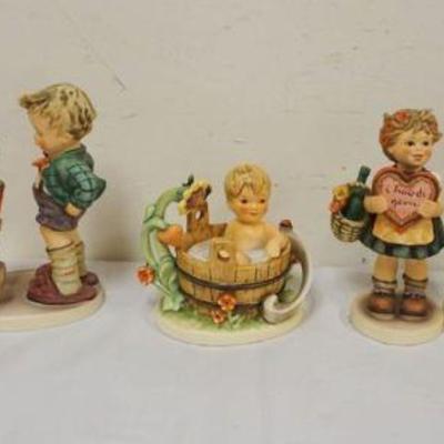 1205	GOEBEL/HUMMEL GROUP OF 7 FIGURINES, TALLEST APPROXIMATELY 7 IN HIGH
