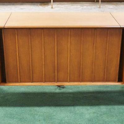 1004	MIDCENTURY MODERN WALNUT STEREO CONSOLE W/UNUSUAL CANTILEVER DOORS FOR SPEAKERS ZENITH, NO TURNTABLE, APPROXIMATELY 54 IN X 17 IN X...