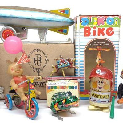 7 Chinese Wind-up Tin Toys