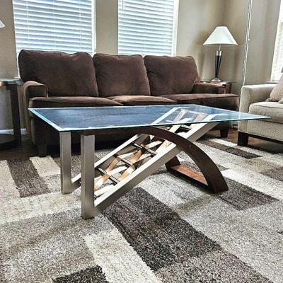Contemporary Glass Top Coffee Table with mixed Wood and metals base 