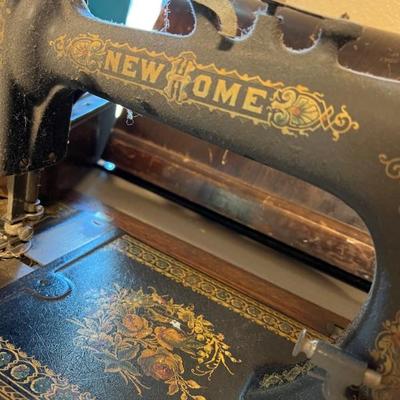 Stunning New Home sewing machine and table-over 100 years old