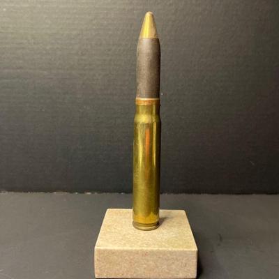 7" Tall Bullet Mounted on 3" x 3" Square of Granite