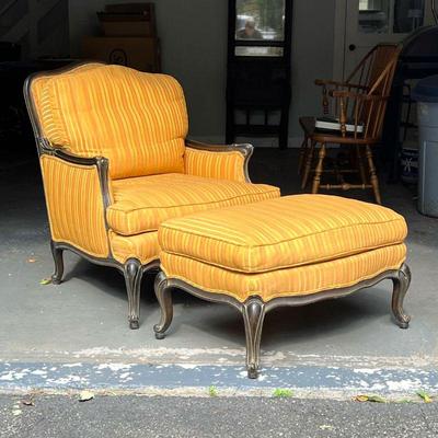 LOUIS XV LOUNGE CHAIR & OTTOMAN | Louis XV lounge chair and conforming ottoman with carved arms and feet. - l. 30 x w. 28 x h. 36 in
