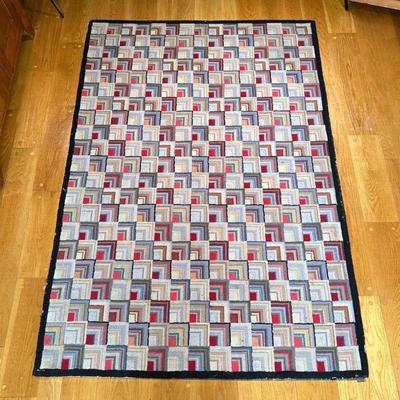 AMERICAN ANTIQUE HOOKED RUG | showing patterns of squares, apparently unsigned. - l. 85 x w. 58 in
