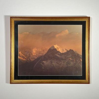 FRAMED MOUNTAIN RANGE PHOTOGRAPH | Depicts sun cascading across large snowy mountain range in gilt frame. 15.5 x 19.5in sight. - l. 24.25...