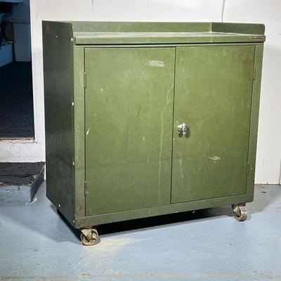 HALLOWELL METAL WORK CABINET | Green metal Hallowell work cabinet in good condition. - l. 36 in x w. 19 in x h. 37.5 in
