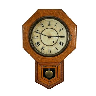 OAK OCTAGONAL HANGING WALL CLOCK | hanging wall clock with opening glass and lower pendulum aperture. - l. 14 x w. 5 x h. 21.5 in

