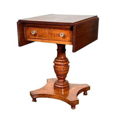 VERY FINE AMERICAN TIGER MAPLE STAND | Drop sides over a single drawer with a solid tiger maple front, single honeycomb turned support on...