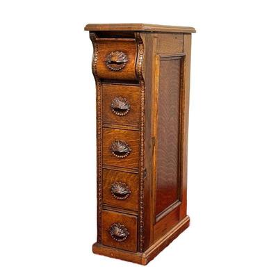 NARROW WOODEN SIDE CABINET | Narrow side cabinet for desk with carved wood clamshell pulls. - l. 16.25 x w. 7.5 x h. 28.5 in
