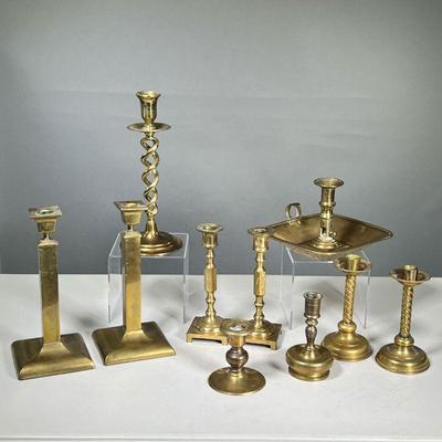 LARGE GROUP BRASS CANDLESTICKS | l. 7.5 x w. 8 x h. 5 in (nightstick)
