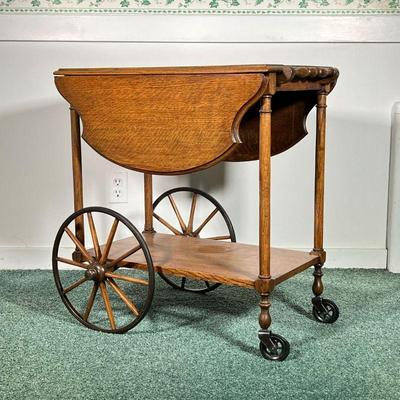 ANTIQUE DROP-LEAF WOODEN BAR CART | Antique bar cart with drop leaf sides and spring-loaded pop-out handle. Leaf length: 10in. - l. 26 x...