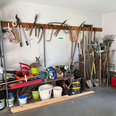 LARGE LOT MISC.GARDEN TOOLS | Including; electronic hedge trimmers, leave blower, shovels, spades, rakes, picks axes, pitchforks, brooms,...
