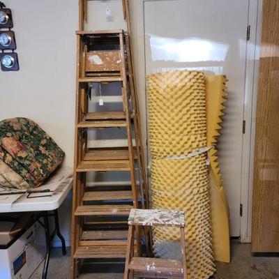 Several wooden ladders