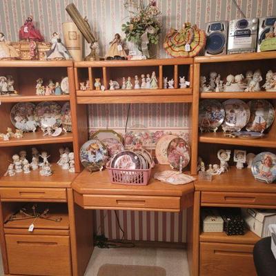 Desk loaded with collectibles