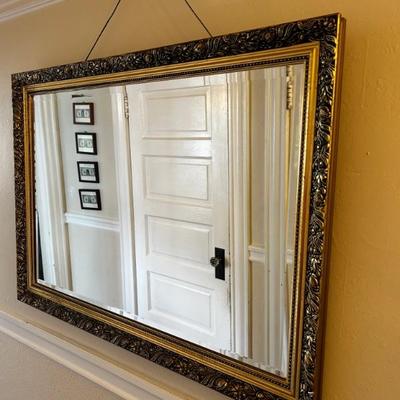 Gold gift accent mirror