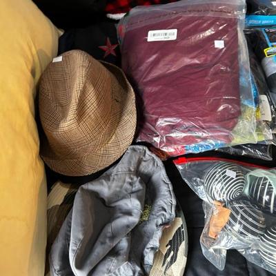 hats and unopened shirts 