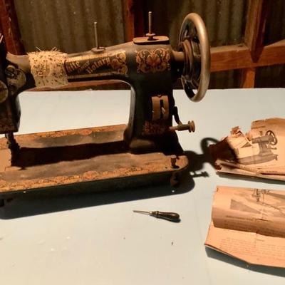 White Family Rotary Sewing machine with original manual and accessories