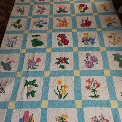 100" x 61 1/2" flower quilt