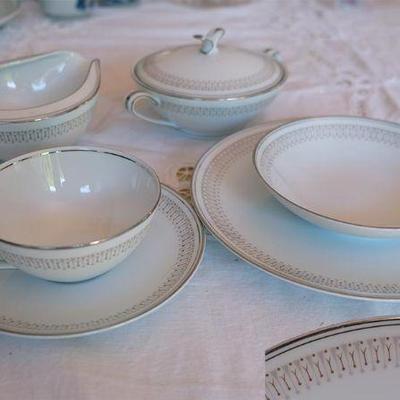 Noritake Leslie Dinnerware Set, 6 full place settings plus gravy boat and small tureen, missing one coffee cup.