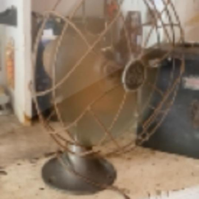 Antique Emerson small electric fan with brass blades