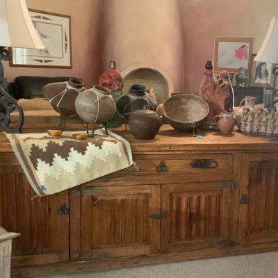 Hand carved large Mexican buffet/chest. Native rug