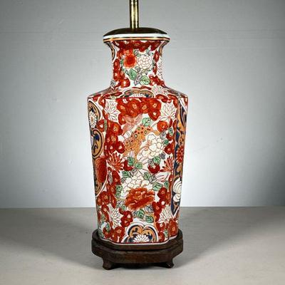 Vibrant Chinese Lamp | Chinese porcelain vase mounted on a wood base, showing foo lions amongst red and white chrysanthemums, with...