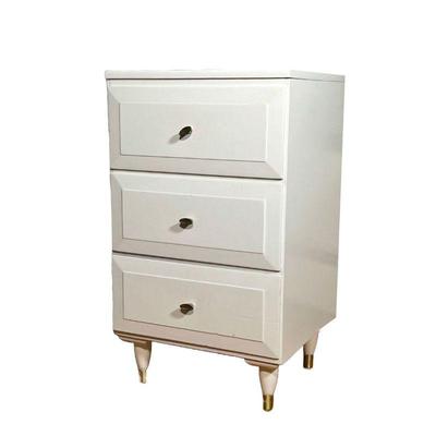 Mid-century End Table | Bedside table / nightstand with three drawers, in white paint. 