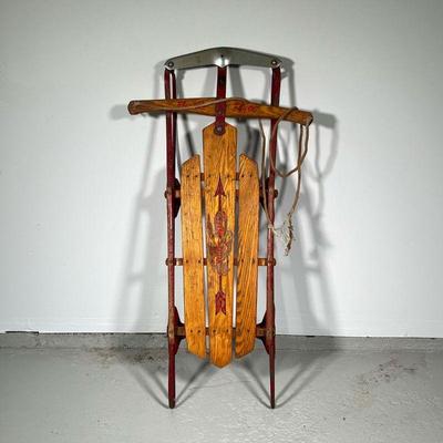 Flexible Flyer Sled | Wood and metal sled with red painting, made in USA. - l. 31.25 x w. 21 in 