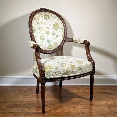Carved Wood Fauteuil | B. Altman collection with textured fabric upholstery with green / light blue floral pattern, wood frame with...