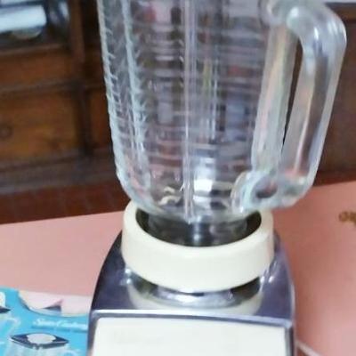 Osterizer blender with book