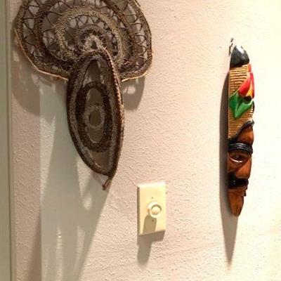 Papau New Guinea woven mask and mask from Caribbean