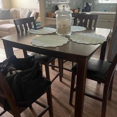Bar top dining room table like new Ashley furniture