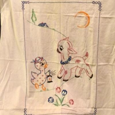 Embroidered baby coverlet