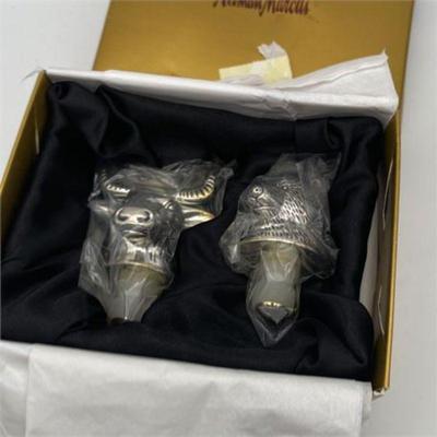 Lot 021   2 Bid(s)
Neiman Marcus Silver Plated Bear and Bull Bottle Stoppers