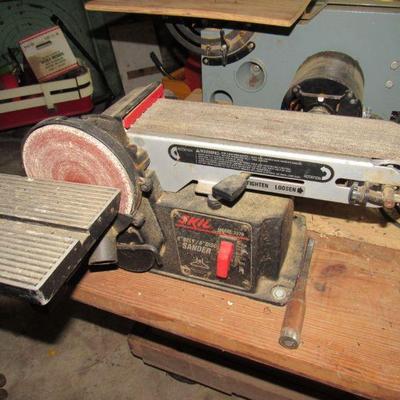 This sander is attached to a work table with 2 band saws.  It will be sold as is.  All three items work