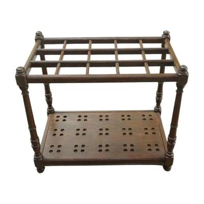 Stunning RARE English oak cane stand made circa 1890s to hold up to 60 canes, originally purchased in London, England. Dimensions are...