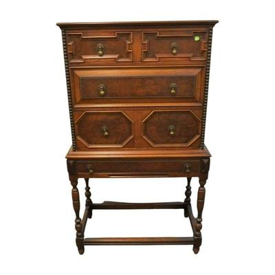 Antique William & Mary Style Chest on Stand. The stand is attached. 4 drawers. 28" wide, 15" deep and 51" tall....