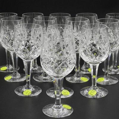 14 Royal Doulton hand cut English crystal water glasses featuring the royal doulton etching on the bottom and a beautiful design. Perfect...