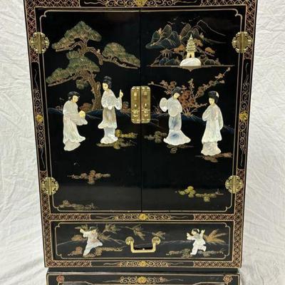 Mid Century Chinoiserie Black Lacquer Inlaid Cabinet, 2 Doors open to 2 shelves over 1 drawer. MOP geisha with handpainted flora and...