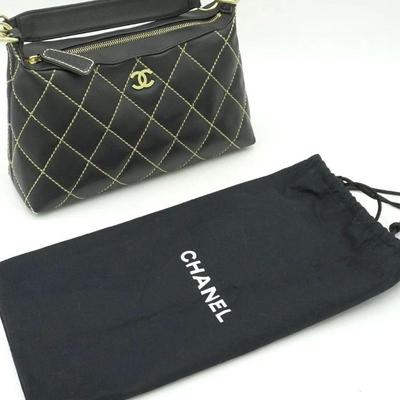 Authentic Chanel wild stitch purse featuring the iconic double c logo and chain details. All leather with nylon interior. Measurements...