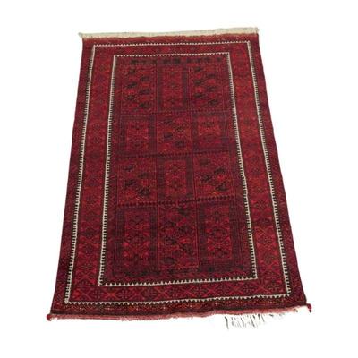 Afghan Baluch Hand Knotted Wool Rug c. 1920-1940. Tribal Pattern. Measures 72"x44". 