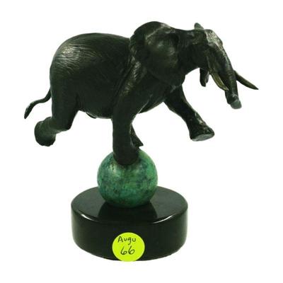 Bronze Circus Elephant on Patinated Ball. Signed on foot. Measures 6"x3"x5 3/4". Weight 4 pds. PROVENANCE: Terri Henning,...