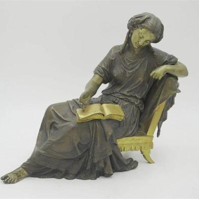 Bronze after Auguste Moreau. Signed to chair. Woman Reading a Book. Measures 13"x4"x11.5". 