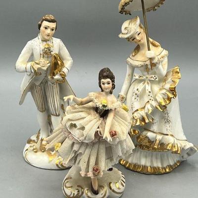 (3) Fine Figurines Incl Lefton
The two larger Victorian figurines are hand painted Lefton and the smallest one was made in Ireland